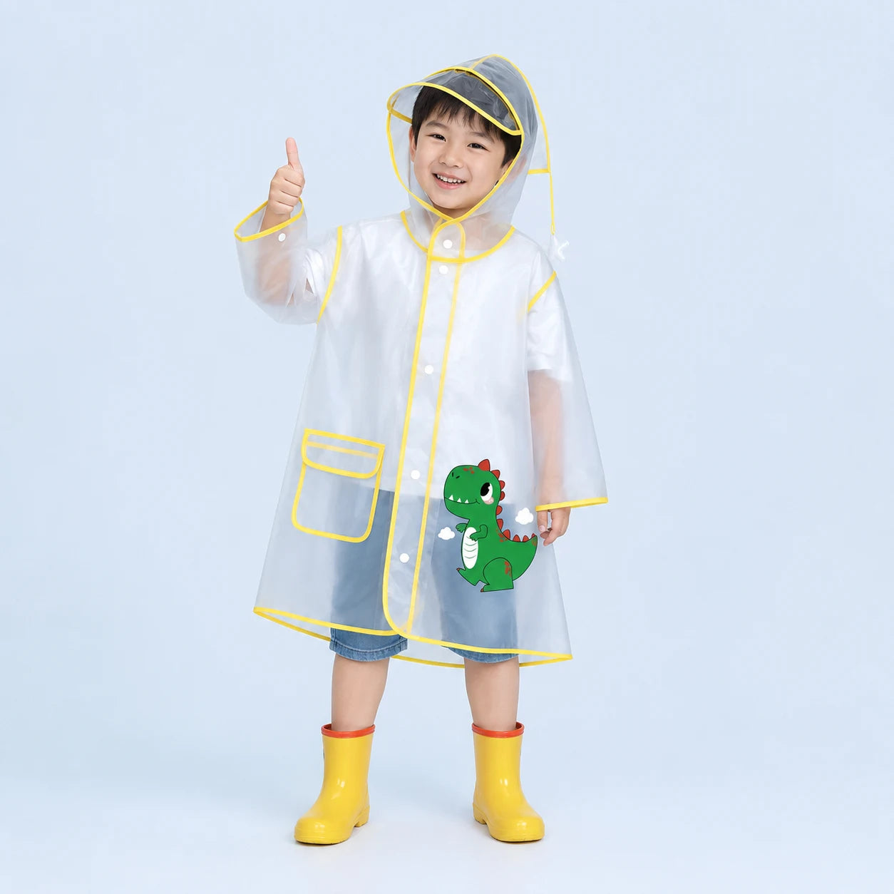 Cape de pluie ecolier dinosaure portee - packshot