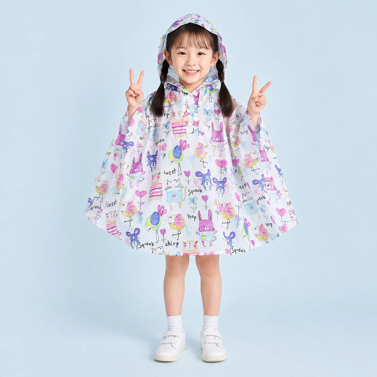 Poncho de pluie lapins et oiseaux porte - packshot