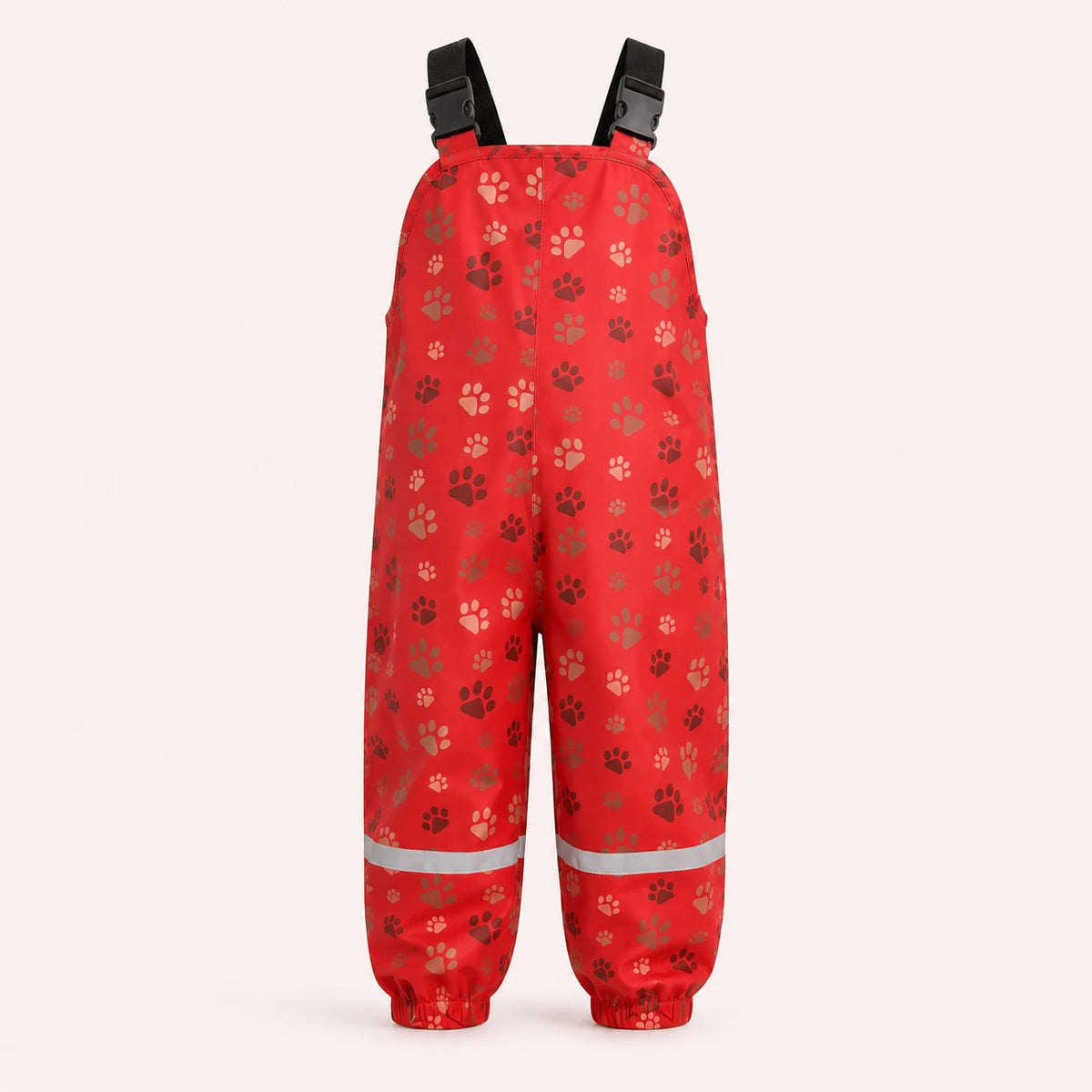 Salopette de pluie enfant rouge motif pattes - packshot produit seul